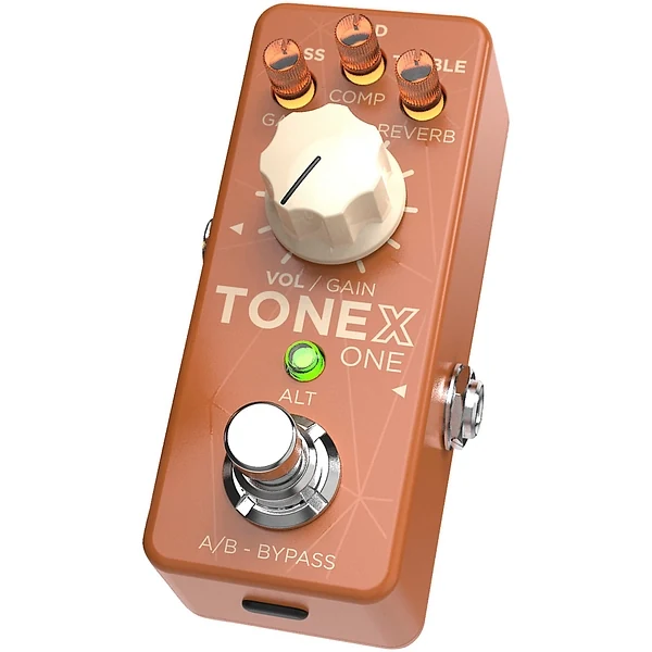 TONEX ONE Double Special brown pedal angled view showing micro knobs, cream VOL/GAIN knob, footswitch and USB-C port